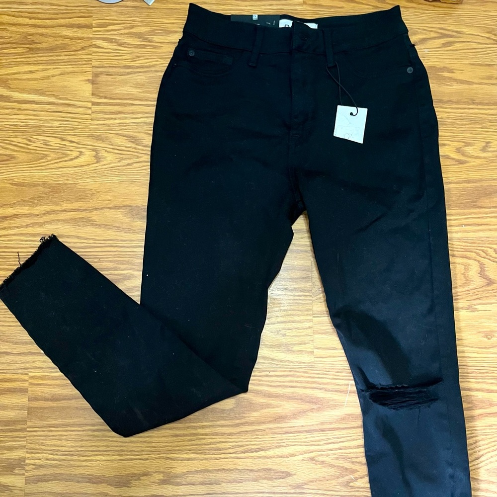 Black ripped cut off pants